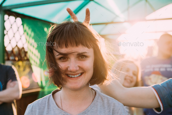 Young Adult Friends Having Fun Together. Young Caucasian Woman W - Stock Photo - Images