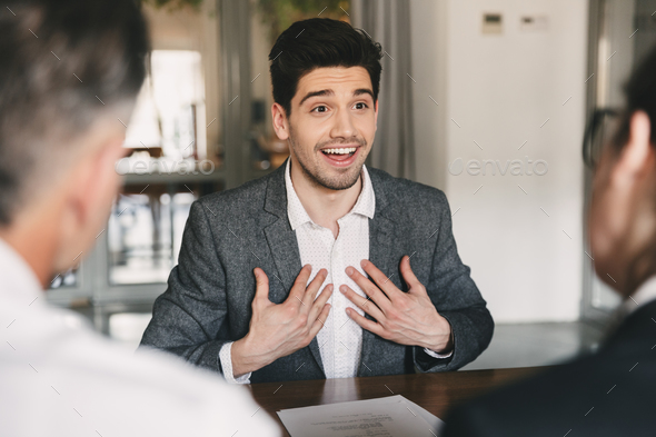 Business, career and placement concept - satisfied caucasian man Stock Photo by vadymvdrobot