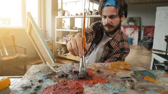 Male Artist Paints Picture, Stock Footage | VideoHive