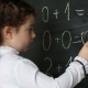 a Little Girl Decides To Examples on the Blackboard - VideoHive Item for Sale