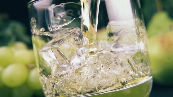 Pour Bourbon Into a Glass of Ice