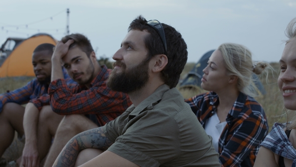 Relaxing Young People Taking Rest in Nature alt