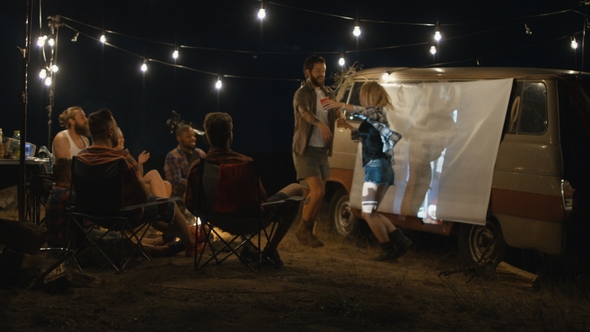 Playful Laughing People Relaxing in Campsite, Stock Footage | VideoHive