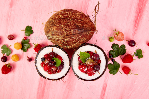 Fruit salad in coconut shell bowl - Stock Photo - Images