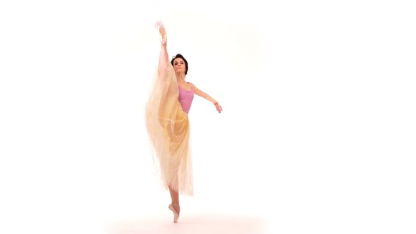 Ballerina Is Dancing in the Studio on a White Background - 