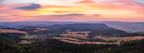 Sunset panorama, inspiring landscape, green forest and mountains - Stock Photo - Images