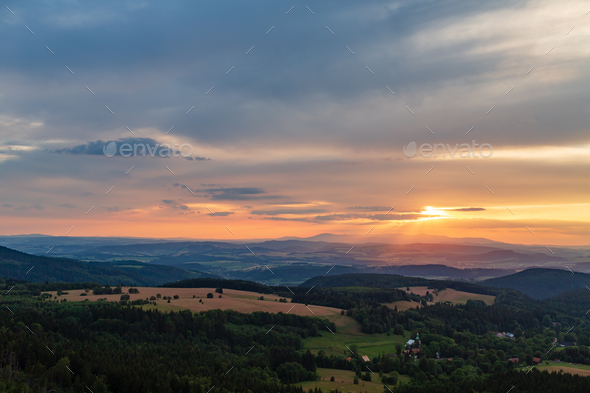 Summer sunset landscape green forest and mountains - Stock Photo - Images