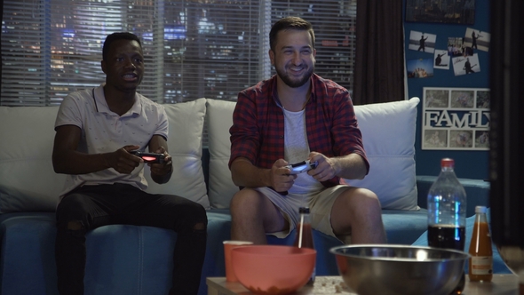 Diverse People Entertaining with Videogame alt