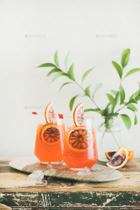 Glasses of Aperol Spritz alcohol cocktail with orange and ice - Stock Photo - Images