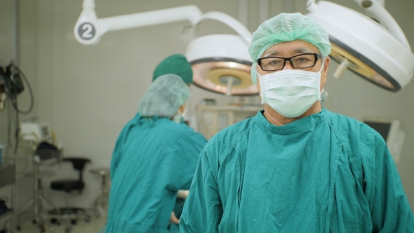 Portrait of Senior Male Surgeon in Operating Theater