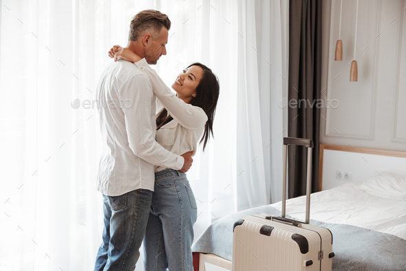 Image of multiethnic couple man and woman wearing casual clothin - Stock Photo - Images