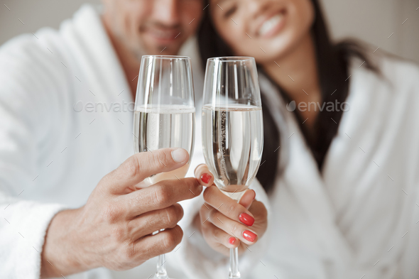 Blurry image closeup of caucasian handsome man and beautiful asi - Stock Photo - Images