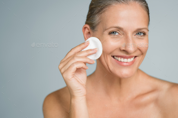 Natural beauty using cotton swab - Stock Photo - Images