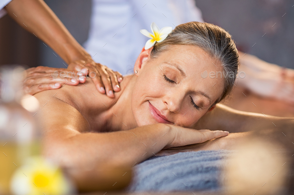 Woman receiving massage at spa Stock Photo by Rido81 | PhotoDune