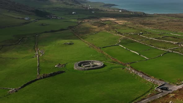 Loher Ringfort, Kerry, Ireland, March 2022. Drone orbits the ancient monument from the northeast asc alt