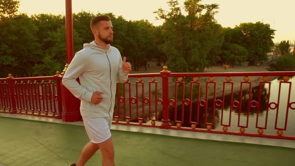 Male Athlete Is Working Out alt