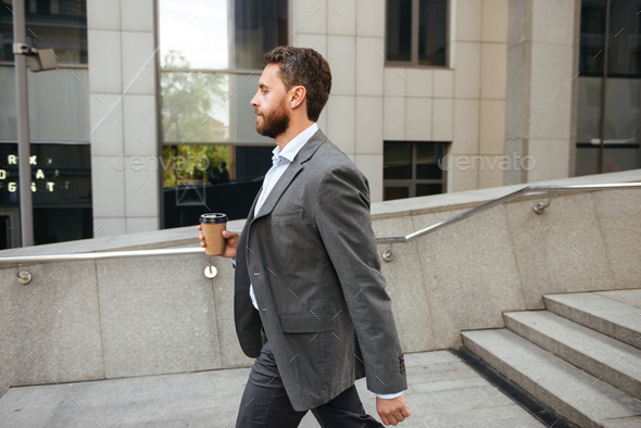 Profile photo of successful entrepreneur or director man 40s in Stock Photo by vadymvdrobot
