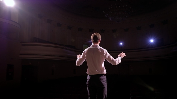 Speaker at Business Conference and Presentation. Audience at the Conference Hall. Person Says About