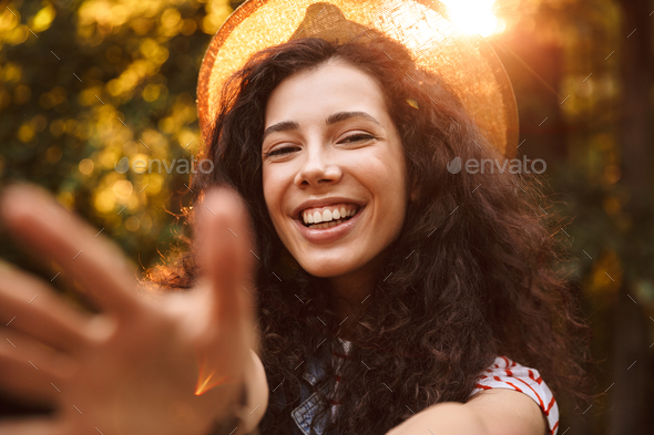 Photo closeup of brunette attractive woman 18-20 wearing summer - Stock Photo - Images