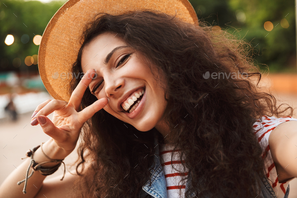 Photo closeup of attractive teenage woman 18-20 wearing straw ha - Stock Photo - Images