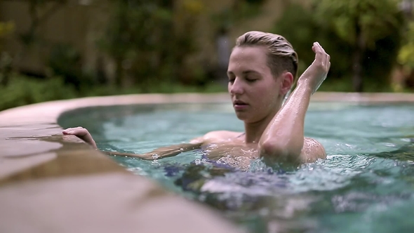 Blonde Girl in Pool