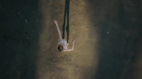 Pretty Ballerina Dancing Outdoors