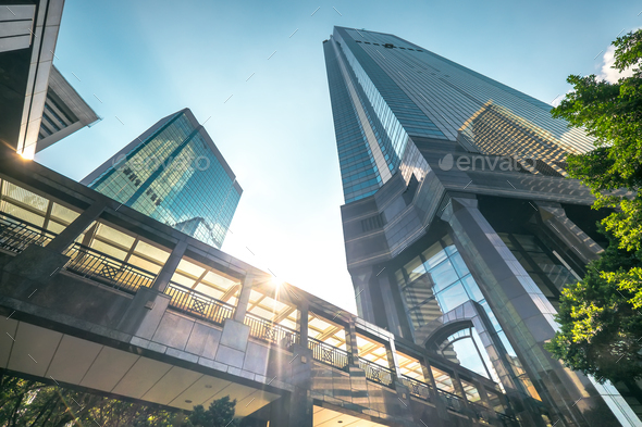 Futuristic cityscape view with skyscrapers at sunset. Hong Kong - Stock Photo - Images