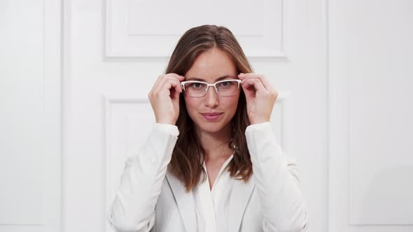 Businesswoman in White Glasses