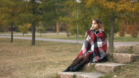 Girl in Autumn Park
