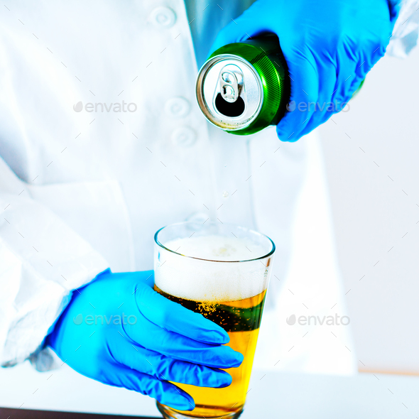Quality control of beer Stock Photo by microgen PhotoDune