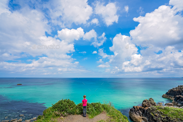 Cute little girl on the Cornish coast - Stock Photo - Images