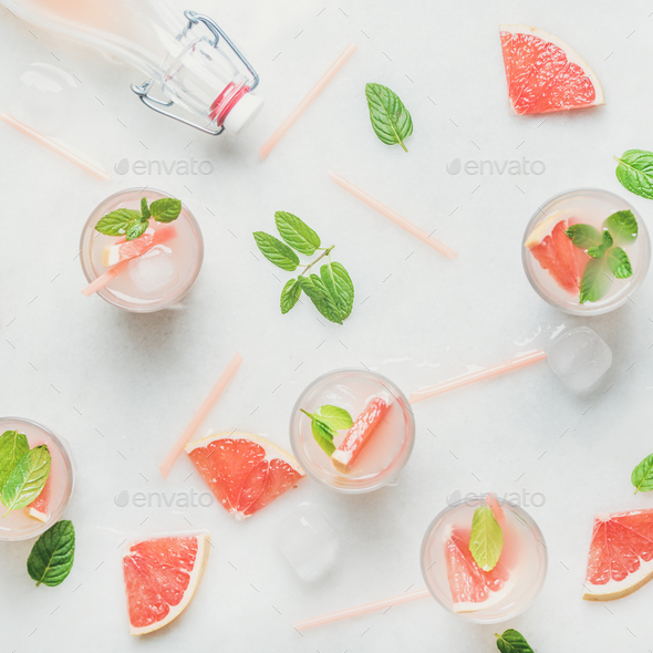 Cold refreshing summer alcohol cocktail with fresh grapefruit, square crop - Stock Photo - Images