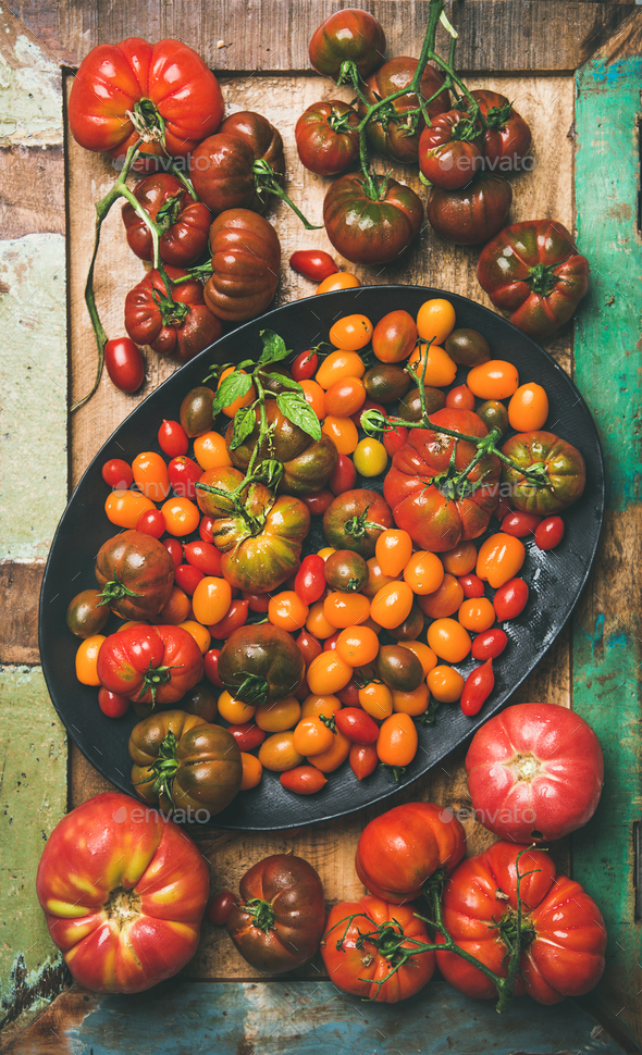 Flat -lay of fresh colorful tomatoes, vertical composition - Stock Photo - Images