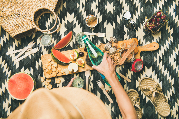 Summer beach picnic setting with charcuterie and fruits, copy space - Stock Photo - Images