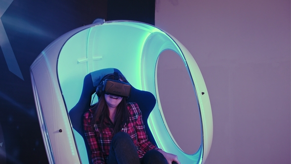 Excited Young Girl Enjoying Virtual Reality Attraction, Stock Footage