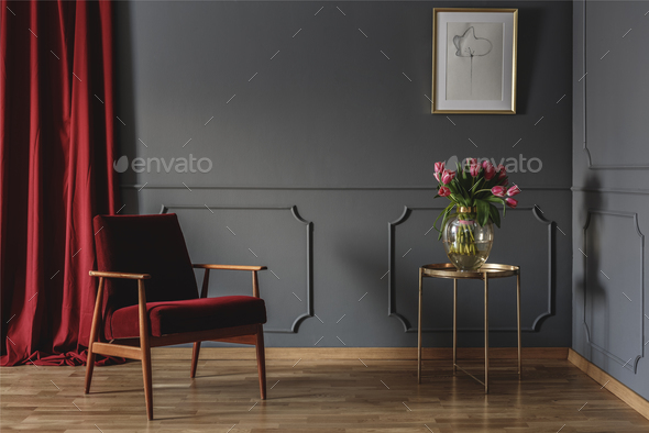 Simple waiting room interior with a single red armchair standing - Stock Photo - Images