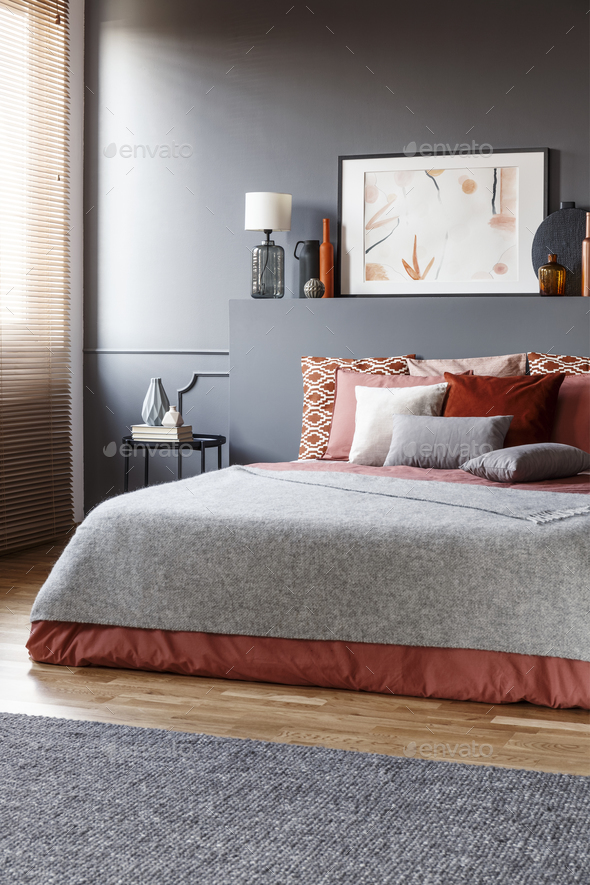 Real photo of dark, elegant bedroom interior with black walls, l - Stock Photo - Images