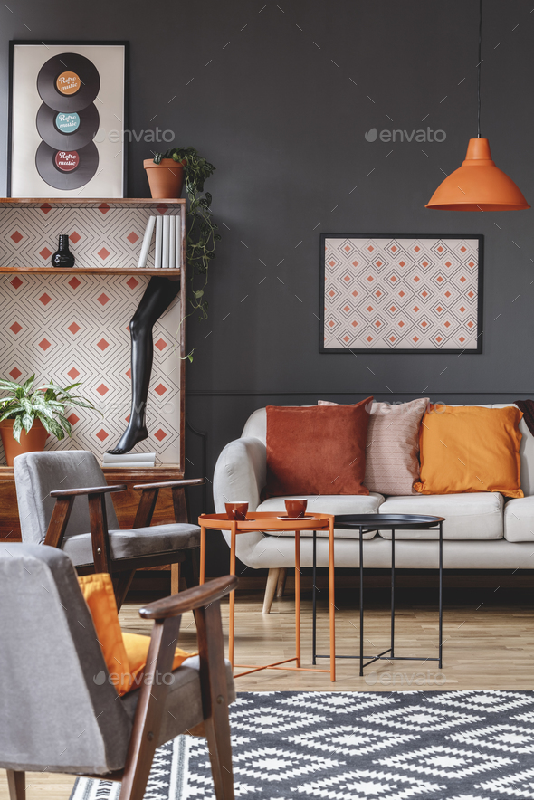 Retro living room interior with armchairs, sofa decorated with o - Stock Photo - Images
