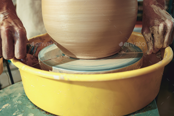 Creating a jar or vase of white clay close-up. Master crock. - Stock Photo - Images