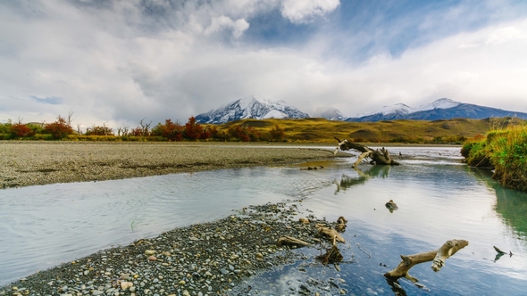 View of the Mountains and the River in Torres Del Paine National Park. Autumn in Patagonia