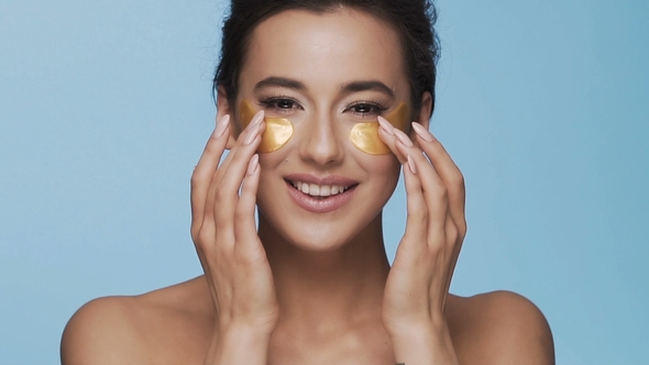 Attractive Brunette Model at Studio Background