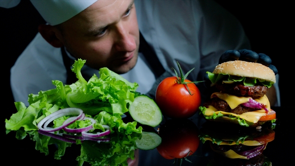Chef Finishing the Savory Burger with Beef, Cheese and Vegetables alt