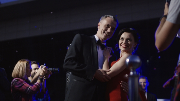 Famous Couple Giving Autographs alt