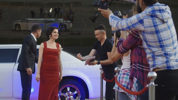 Celebrity Woman Taking Selfie with Fan alt