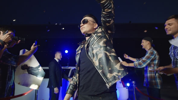 Rock Band Walking on Red Carpet alt