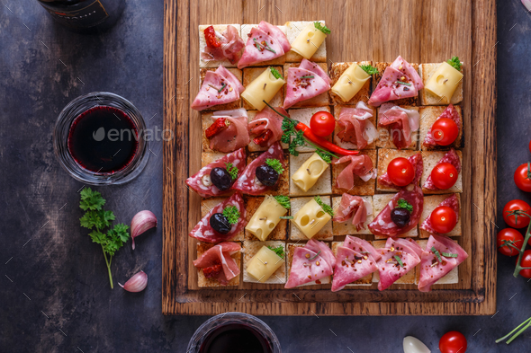 Tasty savory tomato Italian appetizers, or bruschetta - Stock Photo - Images
