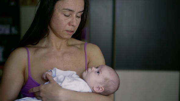 Newborn Baby with a Young Grandmother alt