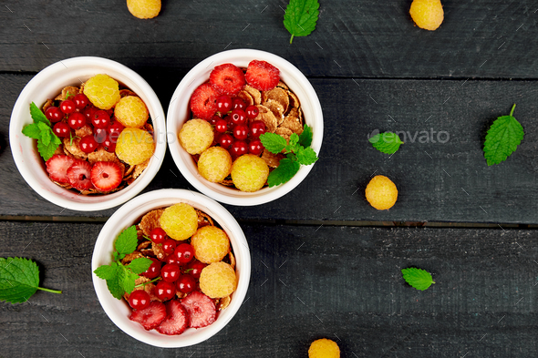Healthy breakfast on white bowls. - Stock Photo - Images