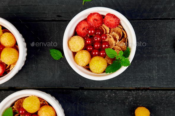 Healthy breakfast on white bowls. - Stock Photo - Images