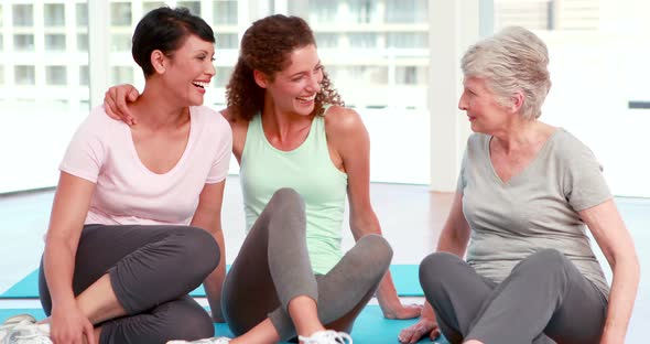 Three Happy Women Chatting alt